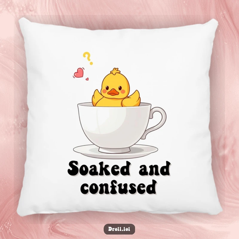 Funny pillow showcasing a bewildered rubber duck adrift in a giant teacup, adding humor to soft furnishings.