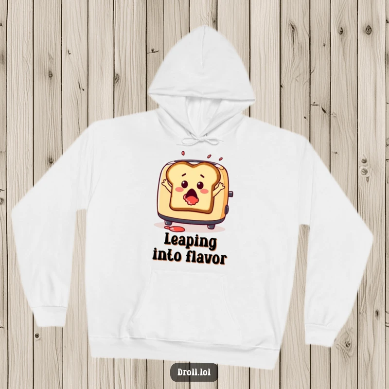Funny hoodie featuring a surprised slice of toast leaping from a toaster with jam splatter, cozy and humorous.