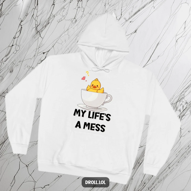 Funny hoodie depicting a bewildered rubber duck lost within a giant teacup, great for cold days and laughs.