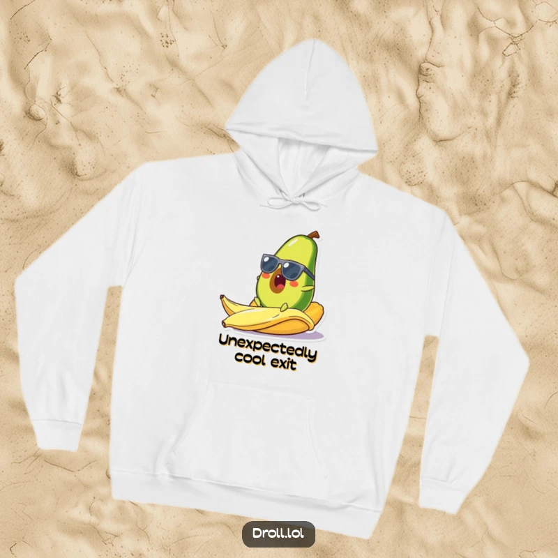 Funny hoodie featuring a cool avocado in sunglasses comically slipping on a banana peel, a warm and humorous apparel item.