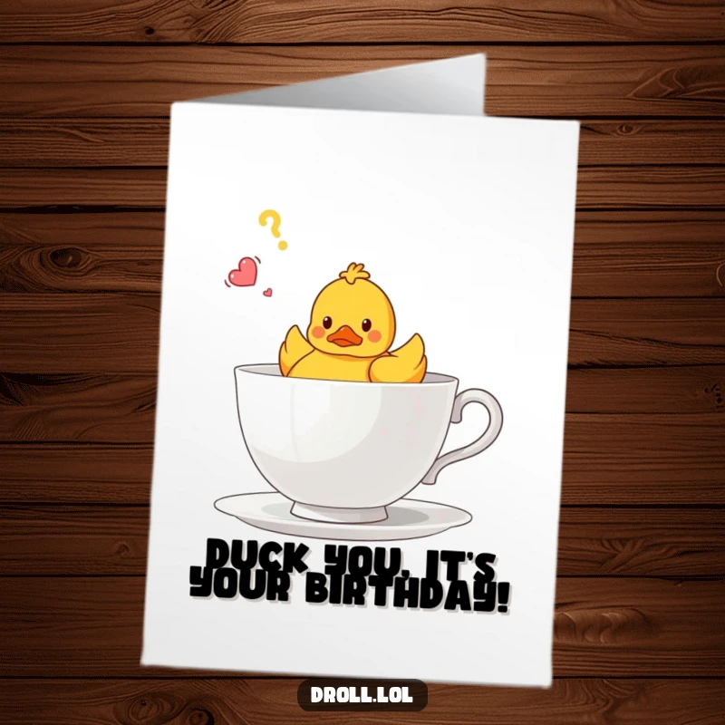 Funny free printable birthday card: A bewildered rubber duck adrift in a massive teacup, radiating pure confusion. Hilarious downloadable art.