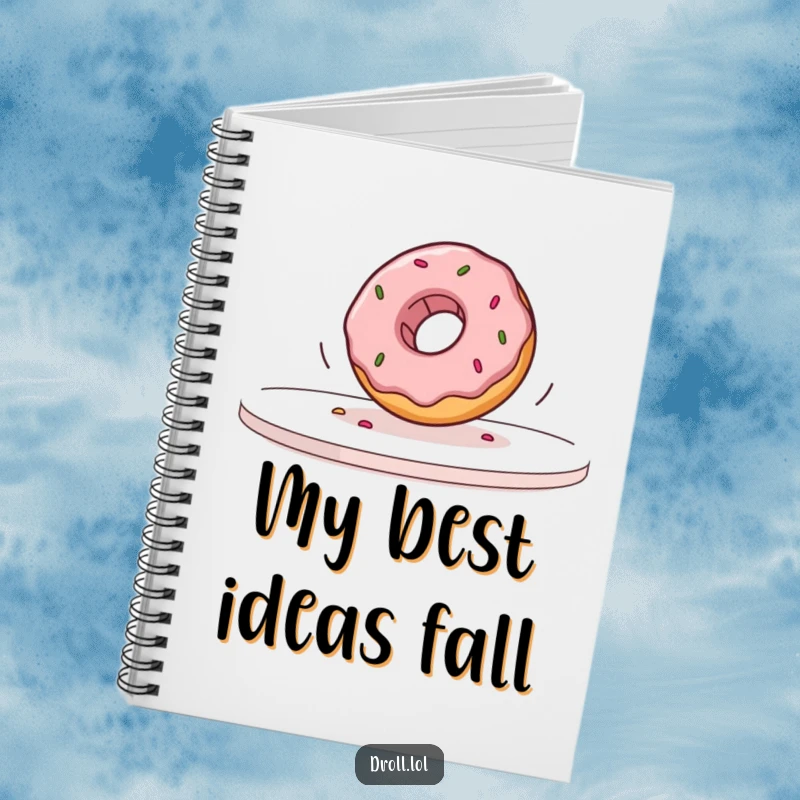 Funny donut rolling off a table in slow motion on a notebook cover, inspiring humorous writing and creative doodling.
