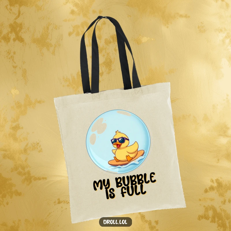 Funny rubber duck with sunglasses surfing a big bubble, a humorous and functional tote bag for beach or shopping.
